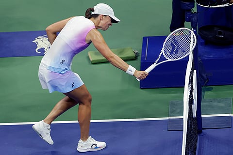 US Open tennis 2024: Iga Świątek, of Poland hits the net with her racquet after losing a point
